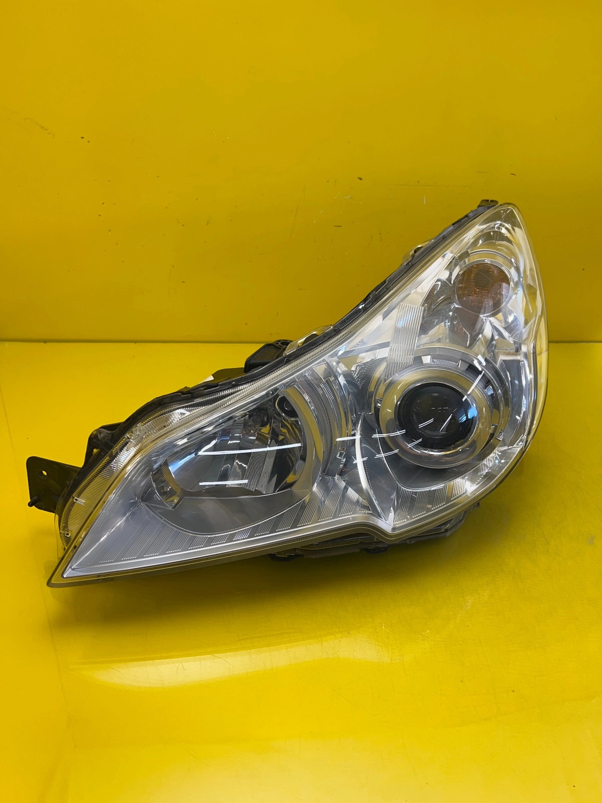 Phare gauche Subaru Legacy V Outback IV Lift Xenon 12-14 Autolamps Phare gauche Subaru Legacy V Outback IV Lift Xenon 12-14