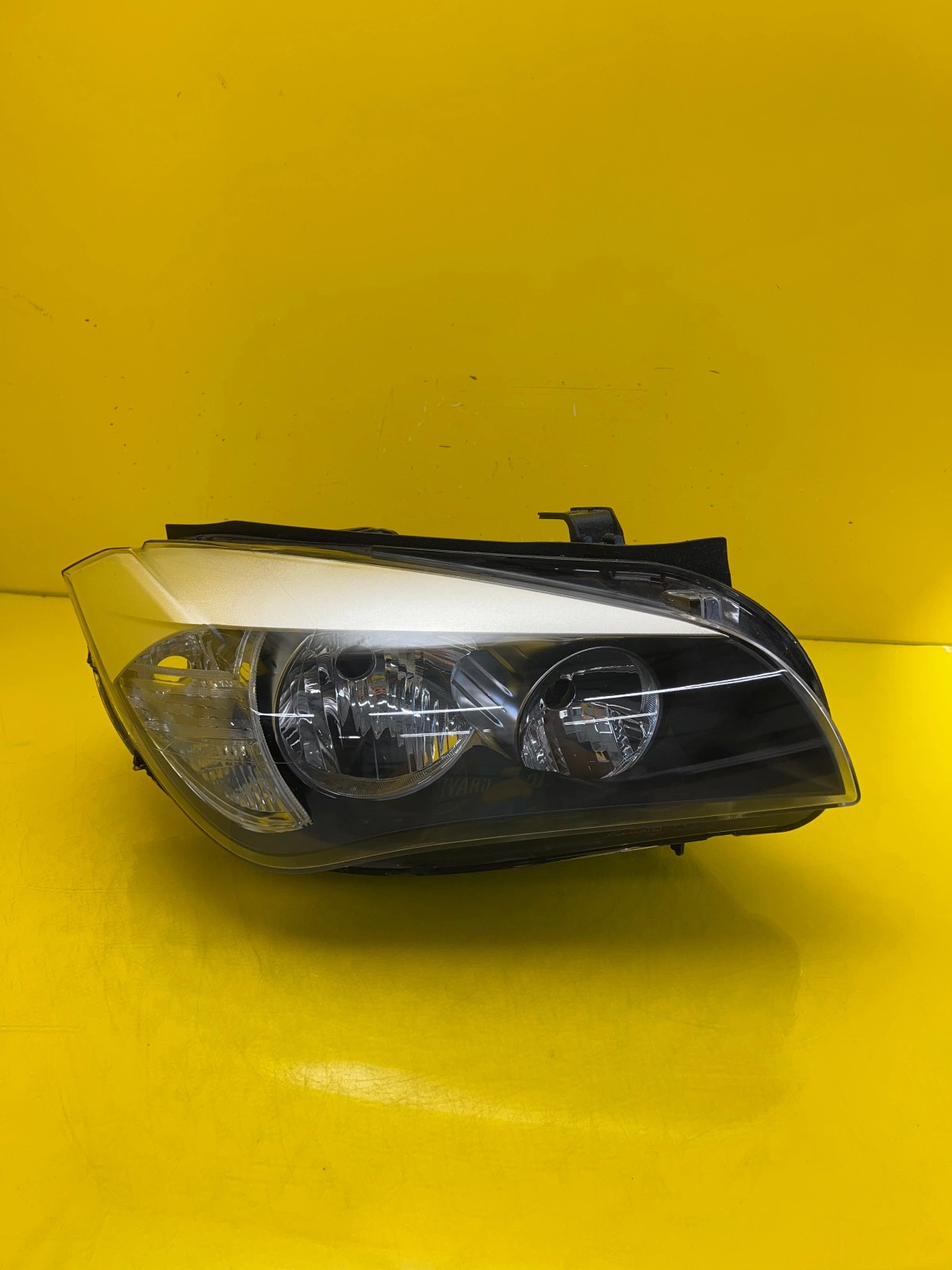 Phare droit BMW X1 E84 Lift Plain 7357434-02 Autolamps Phare droit BMW X1 E84 Lift Plain 7357434-02